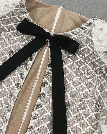 The Diamond Mesh Plunge Mini Dress